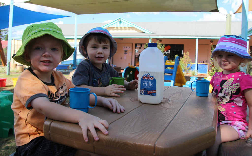 MILKY SMILES: Luca McKenzie, Christopher Pampling and Hannah Pampling get their daily does of calcium at Goodstart Early Learning Centre on Percy St. MILKY SMILES: Luca McKenzie, Christopher Pampling and Hannah Pampling get their daily does of calcium at Goodstart Early Learning Centre on Percy St.